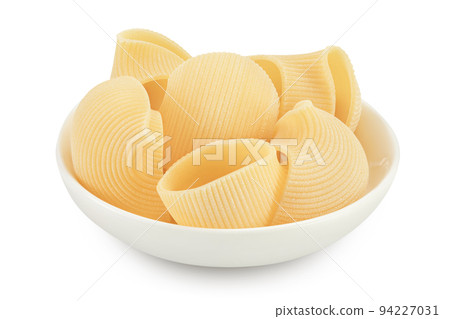 lumaconi pasta in ceramic bowl isolated on white background with full depth of field lumaconi pasta in ceramic bowl isolated on white background with full depth of field 94227031