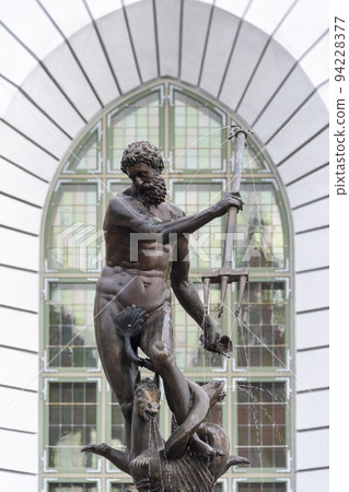 Neptune fountain in Gdansk, Pomerania, Poland. Sculpture in Old Town. Gdansk historical city landmark. 94228377