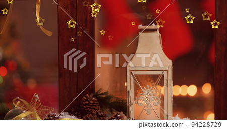 Image of stars falling over winter window with christmas decorations 94228729
