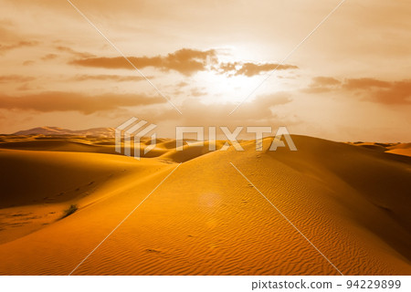 Majestic beautiful scene of Merzouga dunes of Sahara desert Morocco. Majestic beautiful scene of Merzouga dunes of Sahara desert Morocco. 94229899