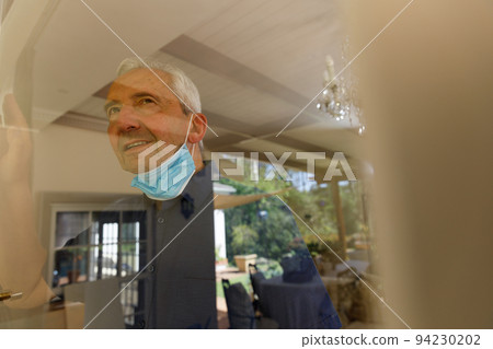 Senior caucasian man spending time at home Senior caucasian man spending time at home 94230202