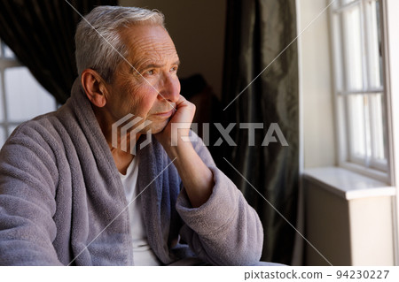 Senior caucasian man spending time at home 94230227