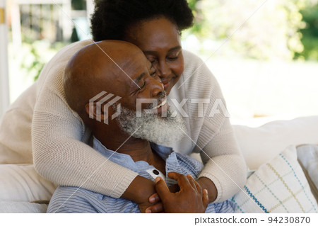 Senior african american couple spending time at home together 94230870