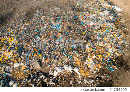Large garbage dump with plastic bags and trash in the country. Environmental pollution concept. 94234395