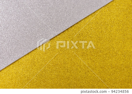Shiny and glittering surface. Silver and gold, abstract background. Events, celebrations. Trendy backdrop for your design. Texture with glitter. Shiny and glittering surface. Silver and gold, abstract background. Events, celebrations. Trendy backdrop for your design. Texture with glitter. 94234856