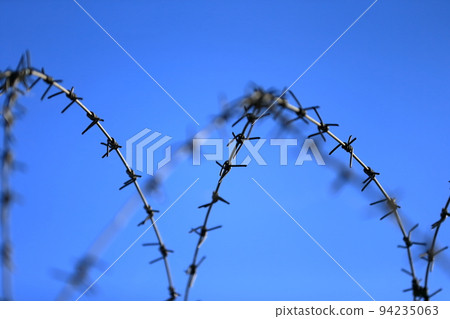 Barbed wire image Barbed wire image 94235063