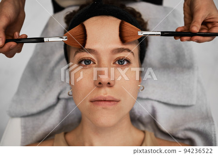 Face massage with brushes. Face massage with brushes. 94236522