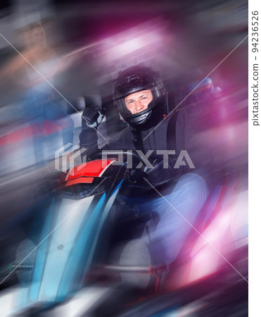 Man finishing race on racing car at kart circuit 94236526