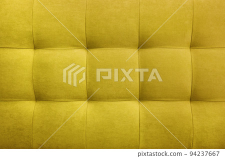 Yellow suede leather background, classic checkered pattern for furniture, wall, headboard 94237667