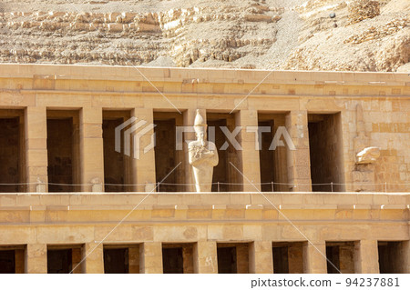 View of Hatshepsut's temple. Mortuary temple of the pharaoh of the Hatshepsut dynasty. Jeser-Jeseru is a masterpiece of ancient Egyptian architecture. The sanctuary is carved right into the rocks. 94237881