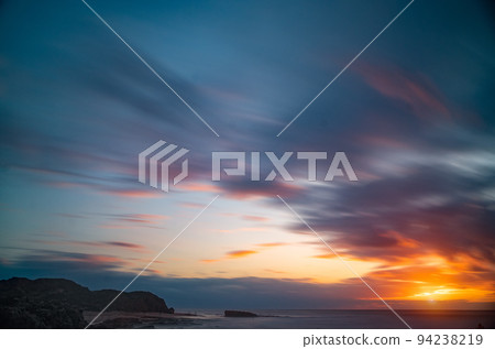 Colorful sunset on mediterranean coast Colorful sunset on mediterranean coast 94238219