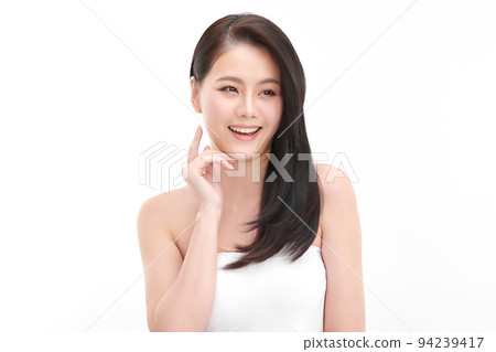 Beautiful young asian woman with clean fresh skin on white background, Face care, Facial treatment, Cosmetology, beauty and spa, Asian women portrait. Beautiful young asian woman with clean fresh skin on white background, Face care, Facial treatment, Cosmetology, beauty and spa, Asian women portrait. 94239417