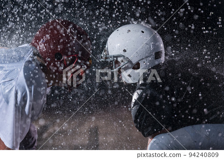 two american football players face to face in silhouette shadow on white background 94240809