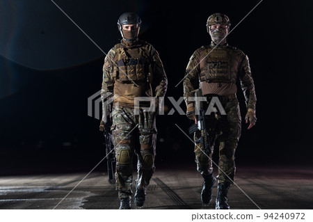soldiers squad in night mission 94240972