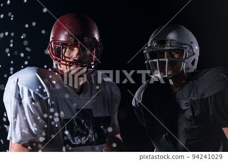two american football players face to face in silhouette shadow on white background 94241029