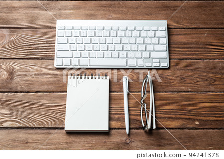 Still life of office workspace with supplies Still life of office workspace with supplies 94241378
