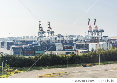 Look over Containers and cranes along the coast of Taichung Port in Taiwan. It is the second-largest port in Taiwan after Kaohsiung Port. Look over Containers and cranes along the coast of Taichung Port in Taiwan. It is the second-largest port in Taiwan after Kaohsiung Port. 94241910