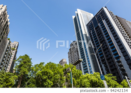 Low angle view of the modern architectural landscape in Taichung, Taiwan. here is near the National Taichung Theater Low angle view of the modern architectural landscape in Taichung, Taiwan. here is near the National Taichung Theater 94242134