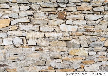 stone wall background closeup stone wall background closeup 94242664