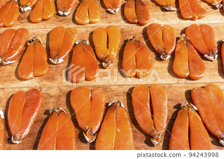 Close-up of drying mullet roe at Lukang Old Street in Changhua, Taiwan. Close-up of drying mullet roe at Lukang Old Street in Changhua, Taiwan. 94243998