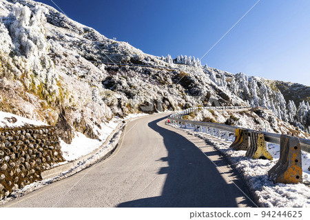 The snow covered forests and roads in Hehuan mountain of Nantou, Taiwan. Taroko National Park is one of Taiwan's most popular tourist attractions. 94244625
