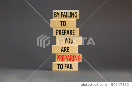 Preparing symbol. Concept words By failing to prepare you are preparing to fail on wooden blocks on a beautiful grey table grey background. Business motivational and preparing concept. Preparing symbol. Concept words By failing to prepare you are preparing to fail on wooden blocks on a beautiful grey table grey background. Business motivational and preparing concept. 94247823