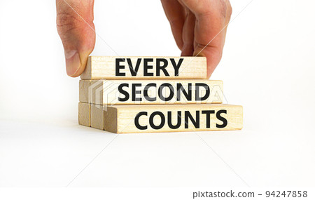 Every second counts symbol. Concept words Every second counts on wooden blocks on a beautiful white table white background. Businessman hand. Business, motivational and every second counts concept. Every second counts symbol. Concept words Every second counts on wooden blocks on a beautiful white table white background. Businessman hand. Business, motivational and every second counts concept. 94247858