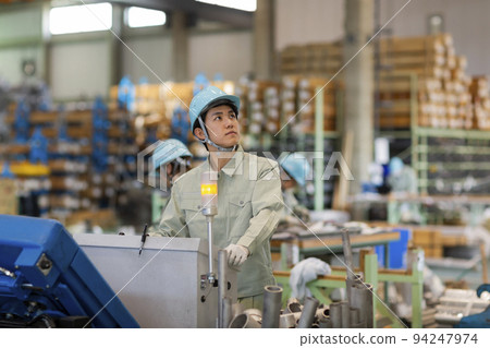 Manufacturing engineer warehouse worker young man 94247974