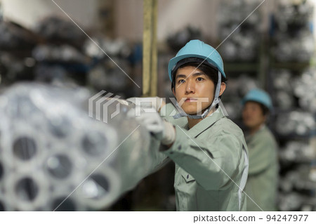 Warehouse worker, young man 94247977