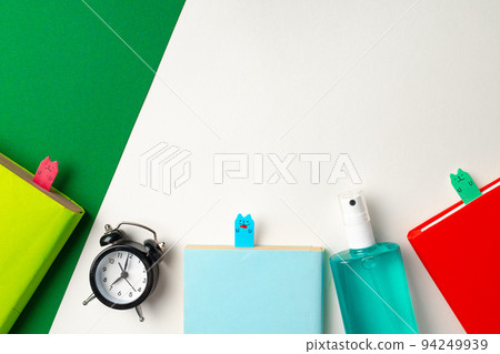 It's time to get back to school. Stationery and alarm clock 94249939