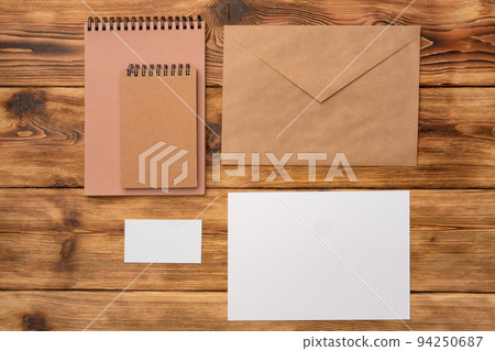 Vintage letters mock up on a wooden table flat lay with copy space 94250687