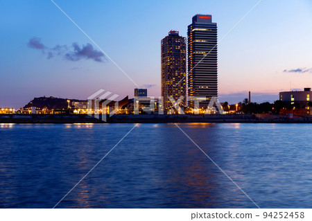 Torre Mapfre and Hotel Arts in evening time 94252458