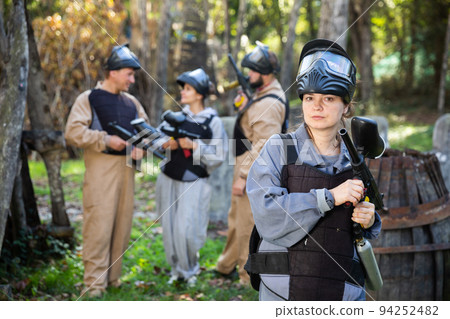 Portrait of young woman paintball player Portrait of young woman paintball player 94252482