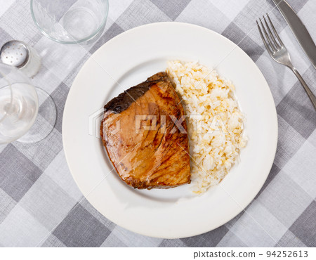 Just prepared fresh tuna fillet with boiled rice 94252613
