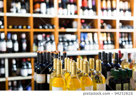 assortment of wine bottles. 94252628