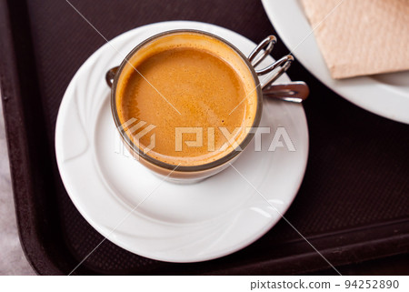 Freshly prepared cortado coffee in cup 94252890