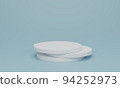 white cylinder podium on light blue background. 94252973