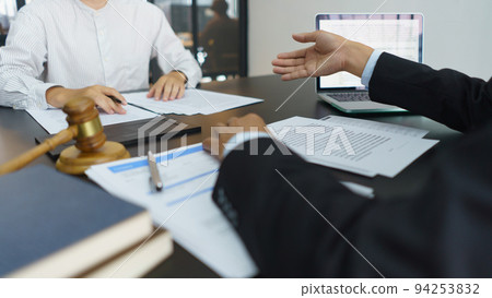Lawyer and legal concept, Senior lawyer explaining contract and agreement to businessman in office Lawyer and legal concept, Senior lawyer explaining contract and agreement to businessman in office 94253832