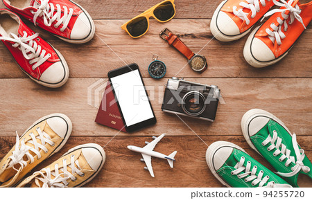 Travel accessories costumes. The cost of travel maps prepared for the trip.travel planning concept 94255720