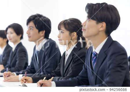 Seminar Young men and women in suits Seminar Young men and women in suits 94256086