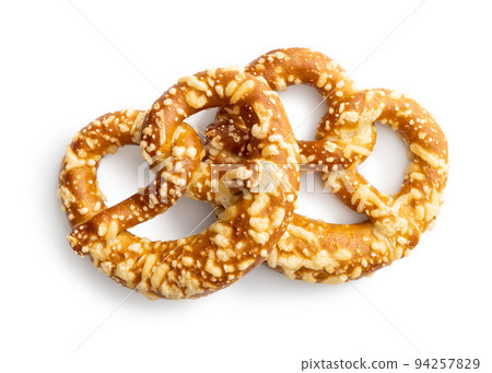 German bread pretzel with baked cheese isolated on white background. German bread pretzel with baked cheese isolated on white background. 94257829