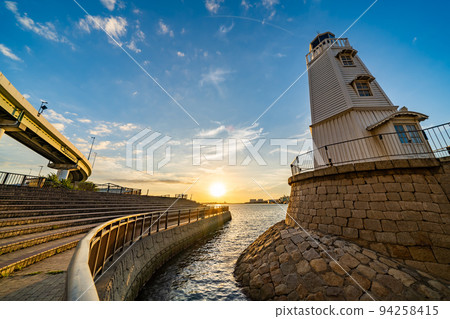 Former Sakai lighthouse illuminated by the setting sun 94258415