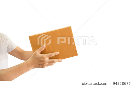Delivery man hand holding parcel cardboard box isolated on white background 94258675