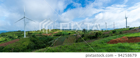 Landscape of Panorama wind turbines on hills with blue sky background. Renewable energy concept 94258679