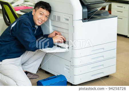 A smiling engineer who received a service call A smiling engineer who received a service call 94258726