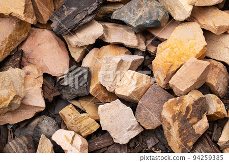 A bunch of different stones, background or texture 94259385