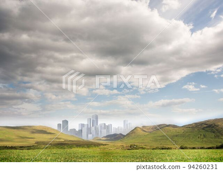 Cityscape in distance in bright landscape Cityscape in distance in bright landscape 94260231