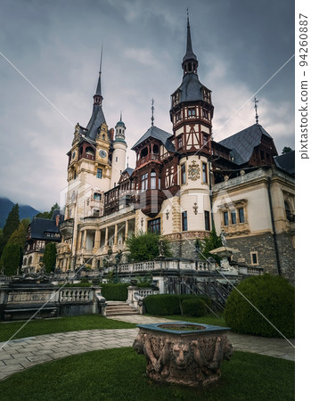 Peles Castle in Sinaia, Romania. Famous Neo-Renaissance palace of the royal family located in the heart of Carpathian mountains. Peles Castle in Sinaia, Romania. Famous Neo-Renaissance palace of the royal family located in the heart of Carpathian mountains. 94260887