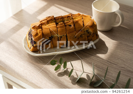 Baked goods on the table by the window Baked goods on the table by the window 94261254
