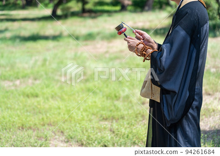 An image of a tree funeral held by a monk An image of a tree funeral held by a monk 94261684